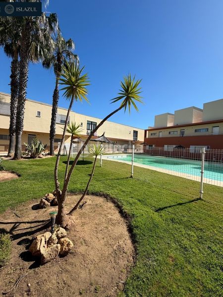 Foto 95304027-c454-4112-ba93-fe7a368a0570. Duplex avec parking piscine dans Islantilla golf Islantilla
