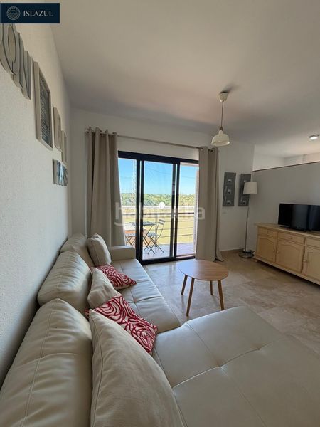 Foto 9a7f7b93-24d8-40c1-940c-149f7efb44a5. Duplex avec parking piscine dans Islantilla golf Islantilla