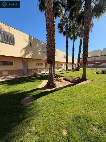 Foto e6838a1c-dd15-47b1-a081-588fcd5da438. Duplex avec parking piscine dans Islantilla golf Islantilla