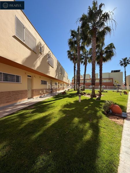 Foto f4e2e7db-c1e1-44ea-b17b-f436ddb4ae89. Duplex avec parking piscine dans Islantilla golf Islantilla