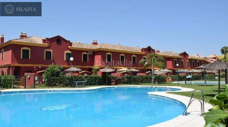 Foto 32894ce6-aa00-4281-9742-611b6bd8b5aa. Casa adossada amb aparcament piscina a Islantilla golf Islantilla