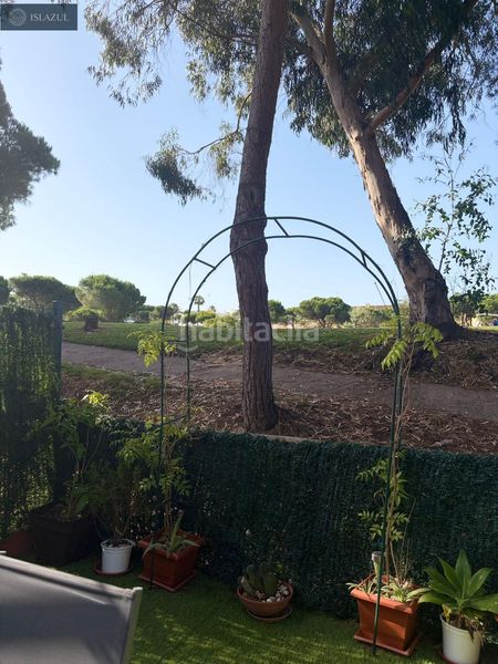 Foto 9bb5f338-61ce-475b-847b-d85f40a71754. Casa adossada amb aparcament piscina a Islantilla golf Islantilla