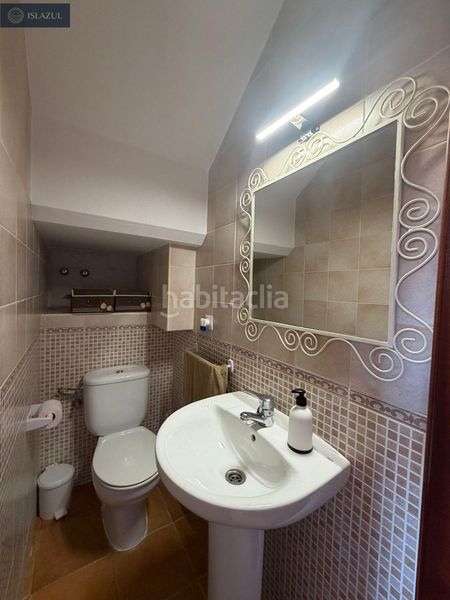 Foto c2149b7f-2d68-4b2a-9df8-c234078e2b70. Casa adossada amb aparcament piscina a Islantilla golf Islantilla