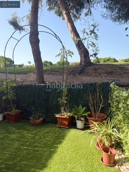 Foto f3d4358b-cac8-4371-9843-e95d7d7c5940. Casa adossada amb aparcament piscina a Islantilla golf Islantilla