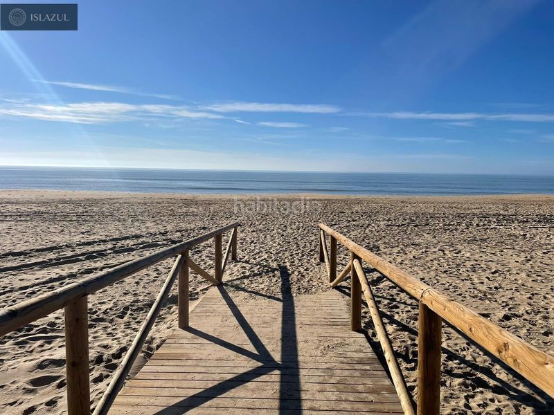 Foto d7b5c3f2-a22d-4c21-95e9-f74e1e72be35. Dúplex amb piscina a Isla Cristina