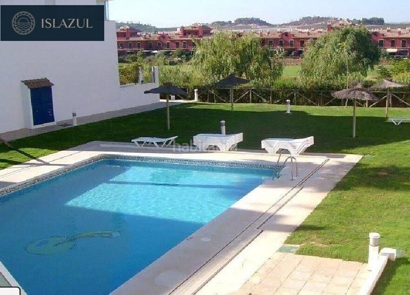 Foto 8f1feb0d-4396-4b4f-93f7-23a91a0dac33. Tríplex amb calefacció aparcament piscina a Islantilla golf Islantilla