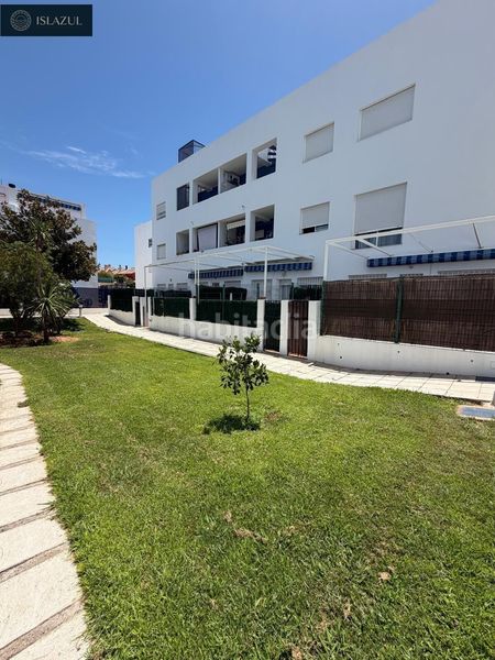 Foto edd6f500-869a-4d1c-a840-645e5e817756. Tríplex amb calefacció aparcament piscina a Islantilla golf Islantilla