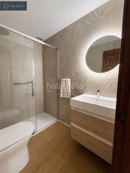 Foto 07766bb3-ffb6-442b-9db2-bfa32b3bae90. Casa aparellada amb calefacció aparcament piscina a Islantilla