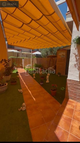 Foto 6d23450d-f98d-4135-ad86-4823e4ec7efa. Casa aparellada amb calefacció aparcament piscina a Islantilla