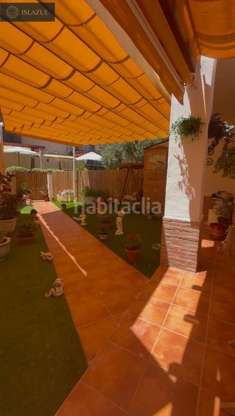 Foto 939f0315-bf82-4b96-963e-35a0e46ca85c. Casa aparellada amb calefacció aparcament piscina a Islantilla