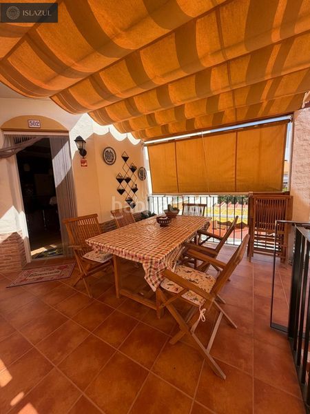 Foto df5f7f74-bfec-44c9-bd5b-9612e5af972d. Casa aparellada amb calefacció aparcament piscina a Islantilla