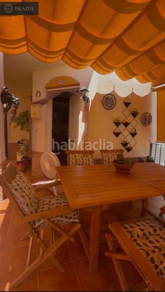 Foto ed75d9f0-b137-4443-a973-210e83732324. Casa aparellada amb calefacció aparcament piscina a Islantilla