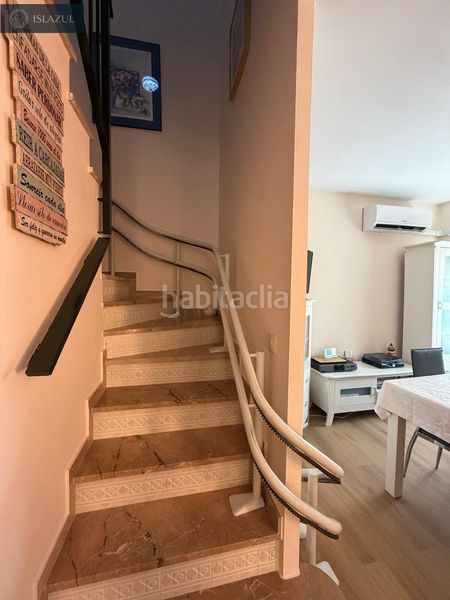 Foto f972d725-c0ac-41b7-9c40-5b98d0296b6a. Casa aparellada amb calefacció aparcament piscina a Islantilla