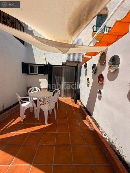 Foto fb7922a0-71ad-433d-8016-f8bab8e085ff. Casa aparellada amb calefacció aparcament piscina a Islantilla