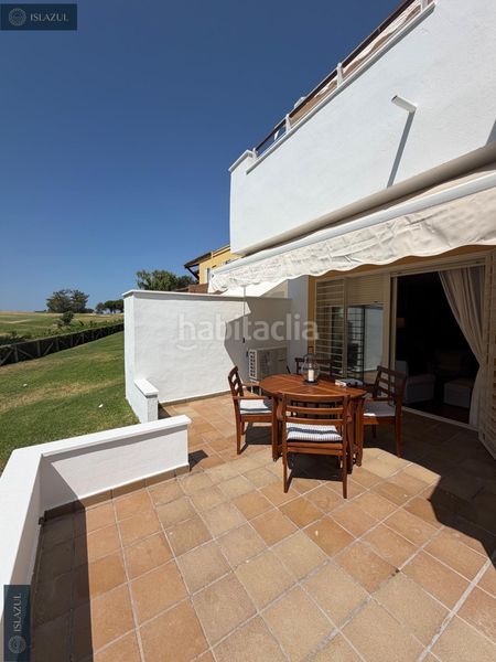 Foto ed44f1e8-652d-49e5-a274-000e8a078e63. Casa adossada amb calefacció aparcament piscina a Islantilla