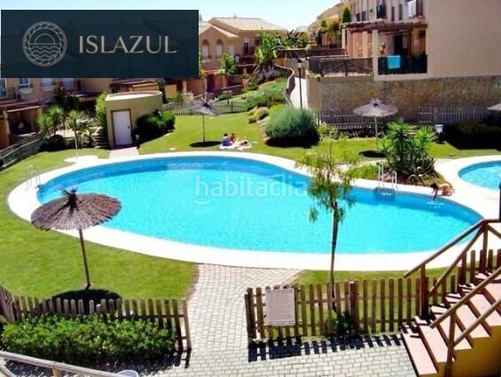 Foto 2ad4f42b-7eb5-4d8f-a12d-62bec769fc77. Casa adossada amb aparcament piscina a Islantilla golf Islantilla