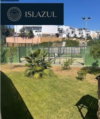 Foto 30e18a77-e9be-4f00-ba30-489fc448387c. Casa adossada amb aparcament piscina a Islantilla golf Islantilla