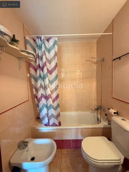 Foto 32dd0d2b-441e-456d-a818-23a8a9e6199b. Casa adossada amb aparcament piscina a Islantilla golf Islantilla