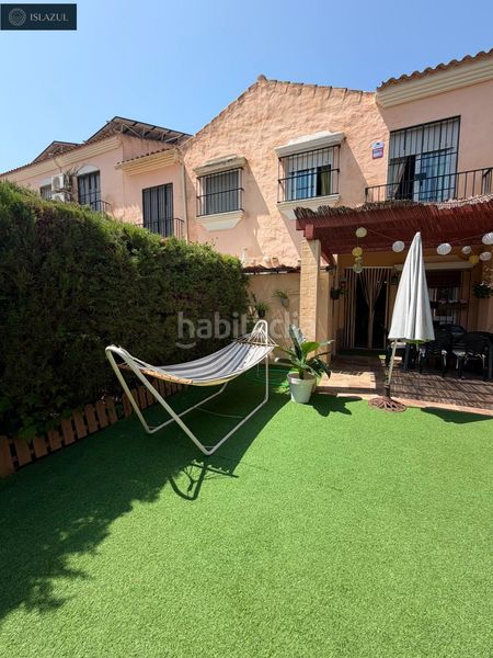 Foto 546a5a1b-d0c5-4db6-8553-cb1b82cabcd5. Casa adossada amb aparcament piscina a Islantilla golf Islantilla