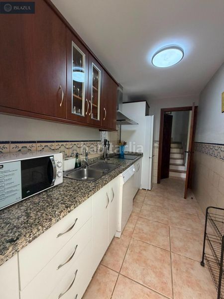 Foto 87d8e1fa-ce8c-4cd2-823a-6bfc7e9e7c9c. Casa adossada amb aparcament piscina a Islantilla golf Islantilla