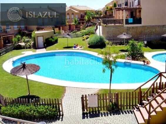 Foto 8f8f163e-dee0-443d-849b-a9726bd01007. Casa adossada amb aparcament piscina a Islantilla golf Islantilla