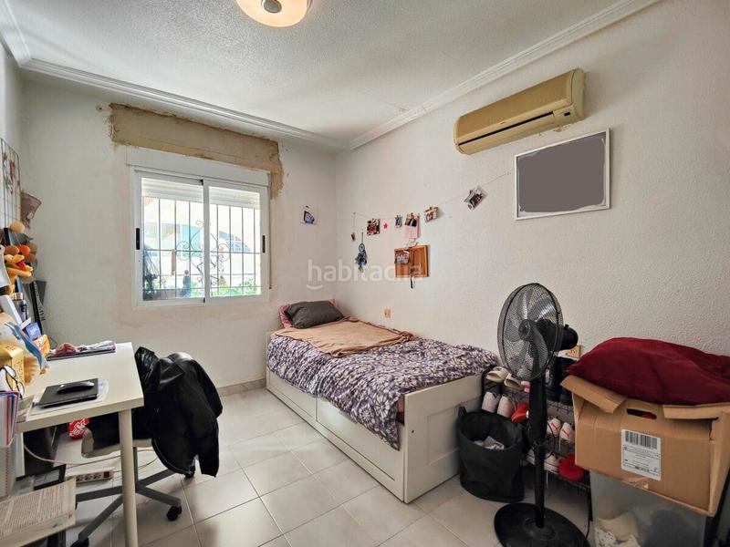 Foto 881ed55f-c30c-47c2-bea2-7b584a63a33c. Casa aparellada amb aparcament piscina a San Miguel de Salinas