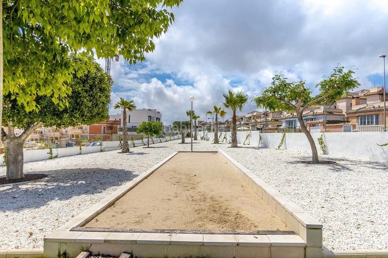 Foto f48a1959-655c-4ff8-ab76-05eb903a97f0. Reihenhaus mit parking pool in Los Almendros Orihuela
