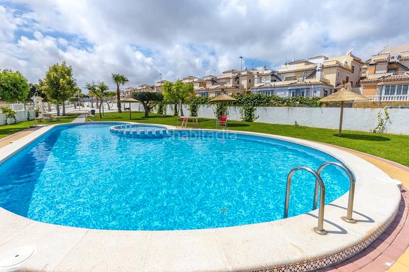 Foto 7eed0a84-570f-4661-9f01-6fe15d6b27c4. Semi detached house with parking pool in Los Almendros Orihuela