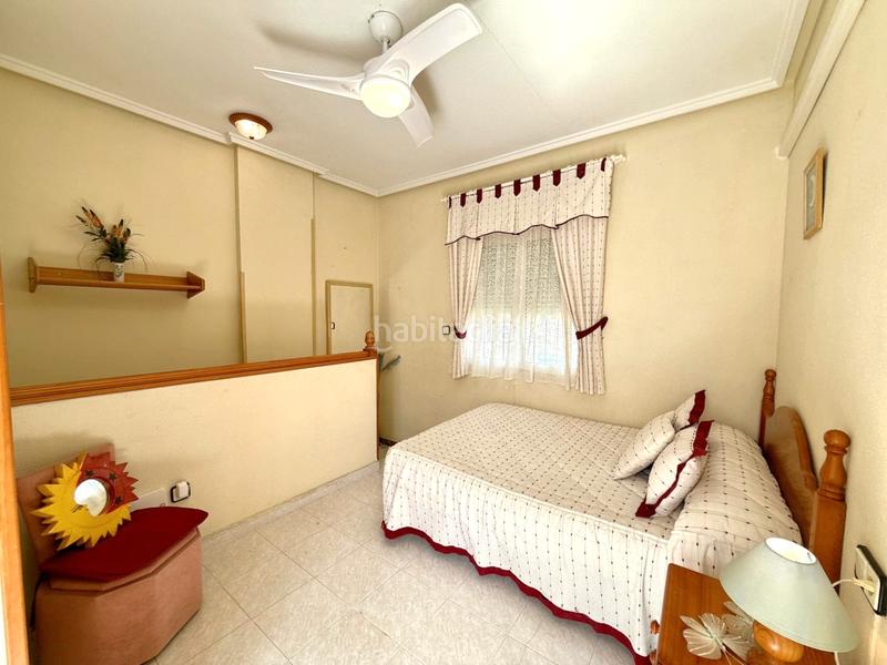 Foto 3cc6b205-f7ce-476f-8f99-949f08fb3ae8. Casa a schiera con camino parcheggio piscina in Los Balcones-Los Altos Torrevieja