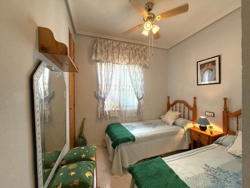 Foto 155b4e29-db29-4013-b30d-23a0e515994b. Maison jumelée avec cheminée parking piscine dans Los Balcones-Los Altos Torrevieja