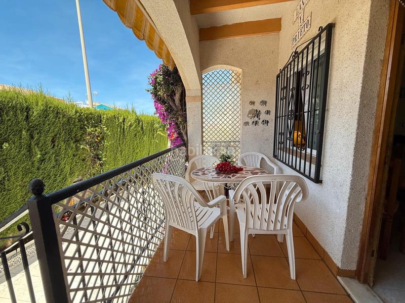 Foto 6089b883-26fe-4a7d-bd8a-776afea2144c. Maison jumelée avec cheminée parking piscine dans Los Balcones-Los Altos Torrevieja