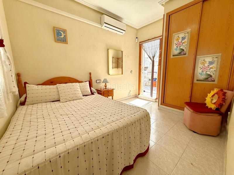 Foto a2c7ebdc-52b4-4c43-a889-9f04ada90375. Maison jumelée avec cheminée parking piscine dans Los Balcones-Los Altos Torrevieja