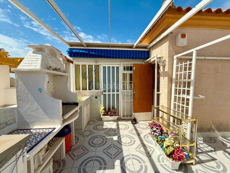 Foto abf8ba28-28ef-4e0e-803a-8c4852136385. Maison jumelée avec cheminée parking piscine dans Los Balcones-Los Altos Torrevieja