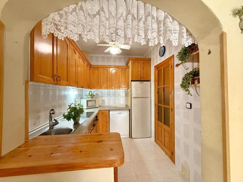 Foto d0fba018-e3fb-42f5-a520-25a0afcf706c. Semi detached house with fireplace parking pool in Torrevieja