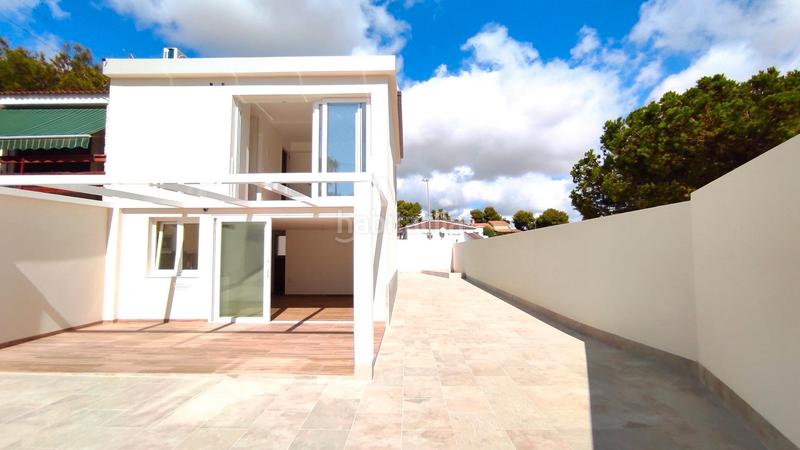 Foto 961f87c7-a2fc-46c9-b36c-8c3d0fdd2ac5. Casa aparellada amb aparcament piscina a Los Balcones-Los Altos Torrevieja