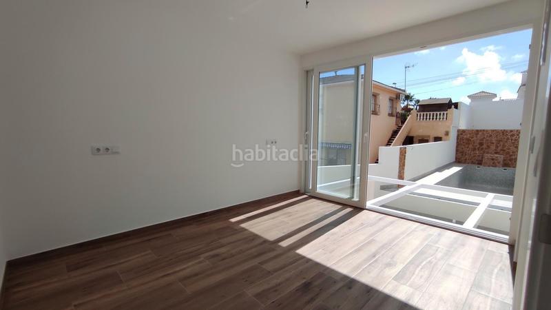 Foto 0f1a9100-ba49-4807-ace7-afd850d8c7d3. Towny house with parking pool in Los Balcones-Los Altos Torrevieja
