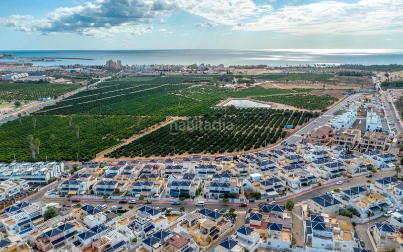 Foto acc8d53c-60f7-47dd-9391-5d2a49717591. Maison jumelée avec parking piscine dans Los Balcones-Los Altos Torrevieja