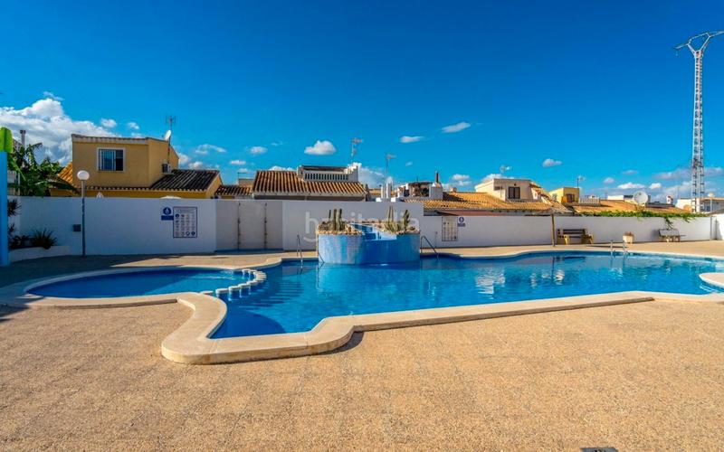 Foto 718bf936-118a-4740-94f4-614c63b8d9db. Semi detached house with parking pool in Los Balcones-Los Altos Torrevieja