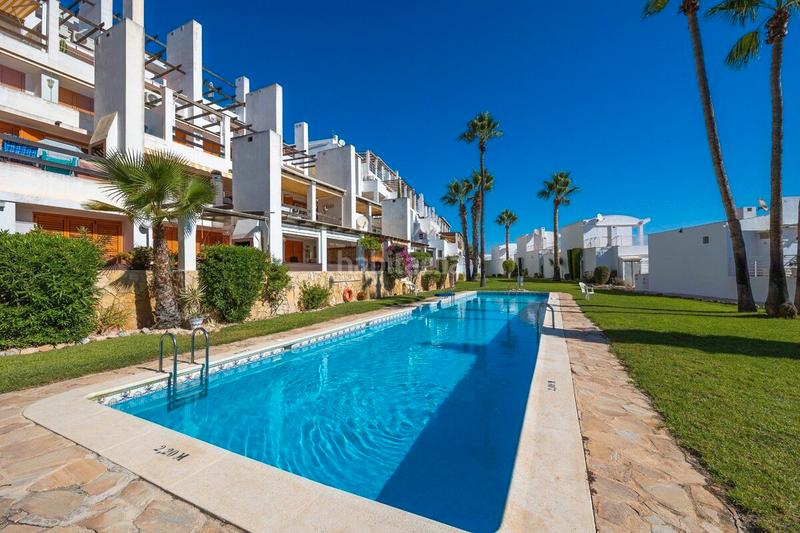 Foto 242379e2-a70a-4ea1-bb15-38eb7353faf2. Attico con camino parcheggio piscina in Lomas de Campoamor - Las Ramblas Orihuela