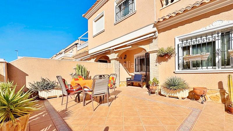 Foto bd015280-98da-4d27-9e8d-aa7dce3bb1f5. Casa a schiera con parcheggio piscina in Villamartín-Las Filipinas Orihuela