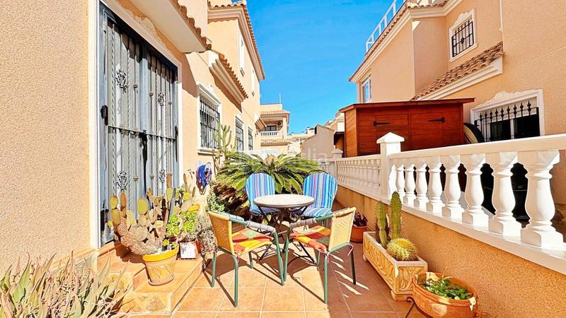 Foto 2d4780af-ef5f-4f2e-96f1-7ef6827c737e. Maison jumelée avec parking piscine dans Villamartín-Las Filipinas Orihuela