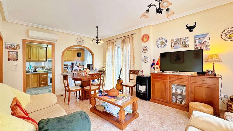 Foto 052608e4-a6a1-4fed-817f-c2f6a24c7223. Reihenhaus mit parking pool in Villamartín-Las Filipinas Orihuela