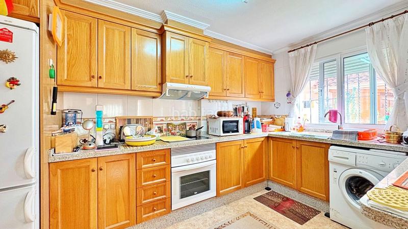 Foto e5611a3b-d4ca-4c66-a188-74b035e45180. Reihenhaus mit parking pool in Villamartín-Las Filipinas Orihuela