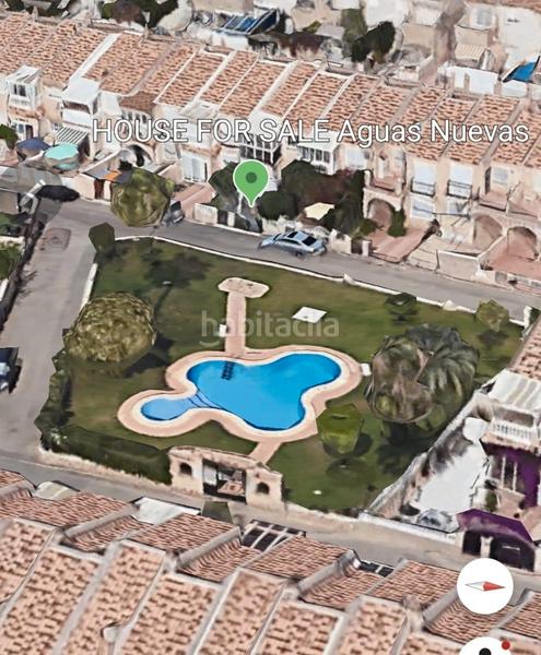 Foto 144a3049-daf7-44fa-bcd7-c3b04f83e2f2. Casa aparellada amb piscina a Aguas Nuevas Torrevieja