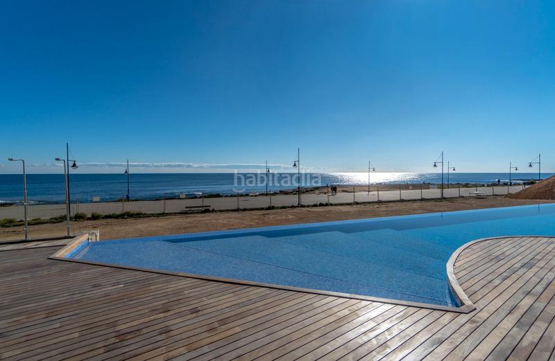 Foto 257c07ca-72c4-4ccf-b763-6459169f1c65. Apartament amb aparcament piscina a Punta Prima Torrevieja