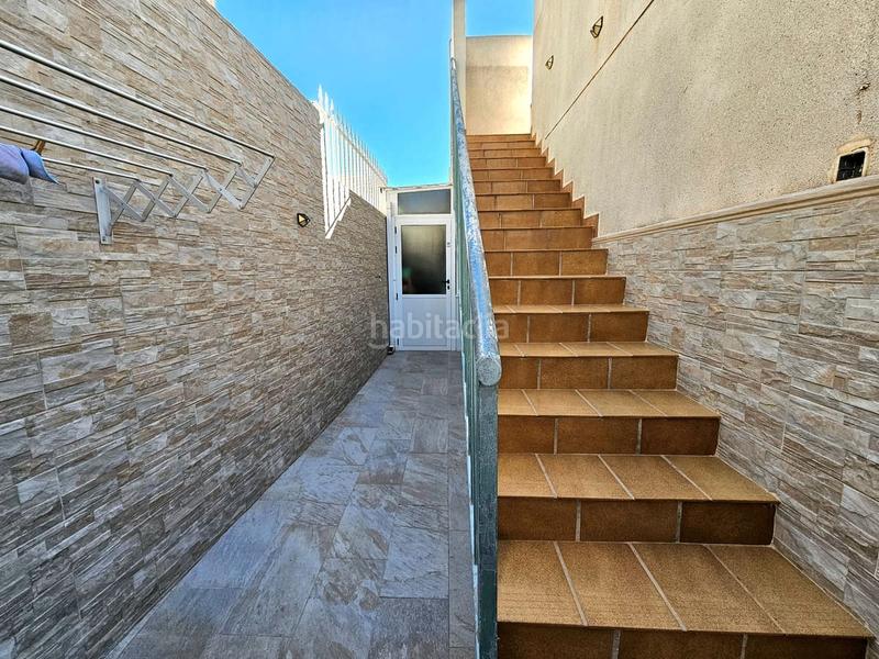 Foto c6011310-0521-4f7c-97ec-64dec51dd7de. Semi detached house with parking pool in Aguas Nuevas Torrevieja