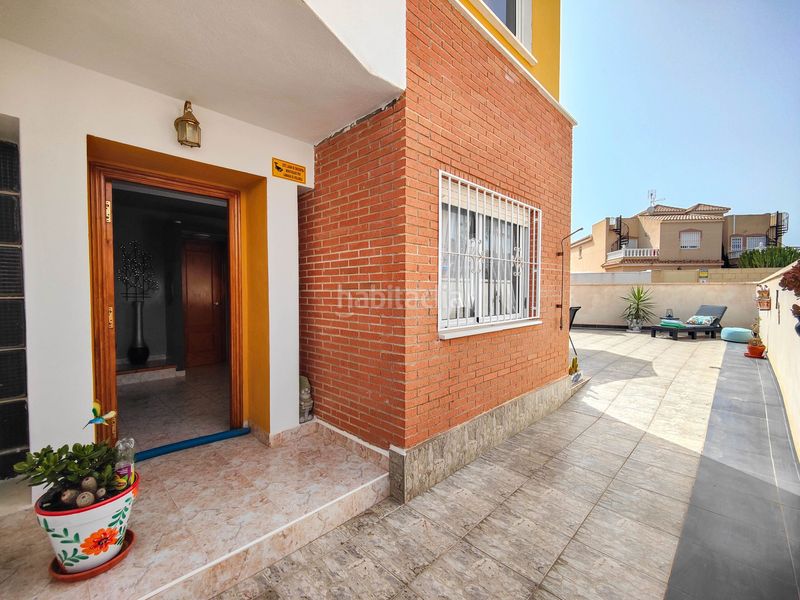 Foto e0d0f1e6-0fc2-4e22-a3a5-ea9016ac20b2. Casa adossada amb aparcament piscina a Los Balcones y los Altos Orihuela