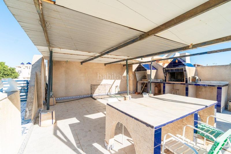 Foto 160fba7c-f191-443e-afc9-20bc48955058. Casa aparellada amb piscina a Parque Acuático - Sector 25 Torrevieja