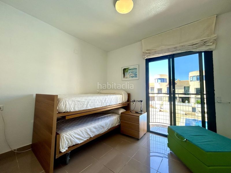 Foto 0a638689-d98b-4a71-bd08-fc05db621e0e. Casa adossada amb piscina a Aguamarina Orihuela