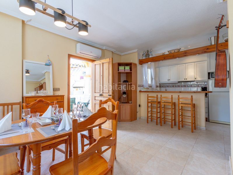 Foto be96334c-6382-4a3c-ac97-06cada4ef9b4. Casa aparellada amb piscina a Playa Flamenca Orihuela